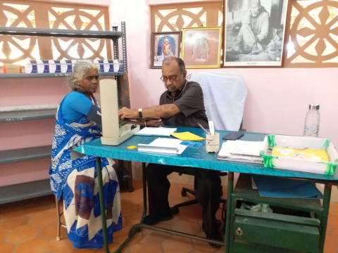 Medical Centre - Doctor attending a patient